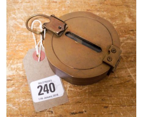 A Clinometer brass compass