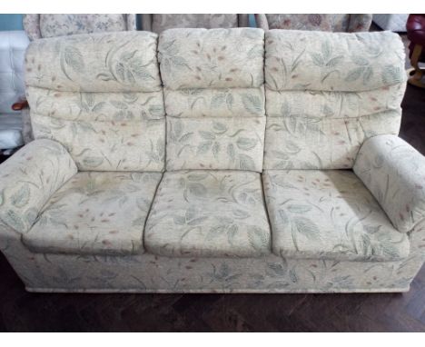 a three seater settee in cream and patterned material by G-Plan and a matching 2 seater manual recliner settee