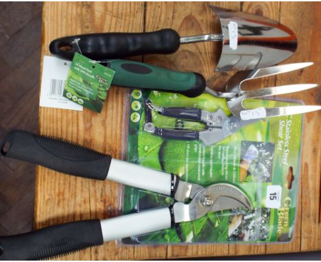 New two piece stainless steel sheer set and a new stainless steel hand trowel and fork 