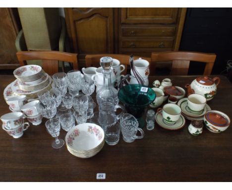 Floral decorated part dinner and tea service, decanter, wine glasses, soup mugs, Devon ware pottery etc 