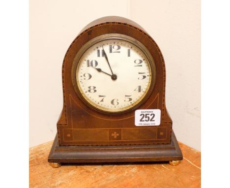 An Edwardian mantle clock in inlaid mahogany case