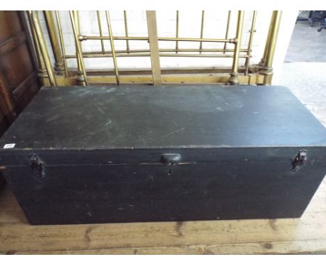 A large stained pine uniform trunk 