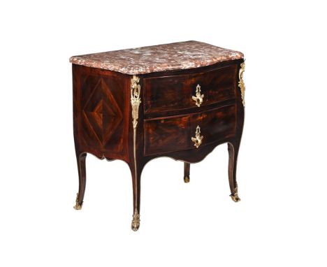 Y&nbspA FRENCH ROSEWOOD AND GILT METAL MOUNTED COMMODE CIRCA 1800, IN THE MANNER OF CHRISTOPHE WOLFF With marble top above th