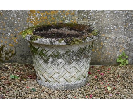 A STONE COMPOSITION 'BASKET WEAVE' PLANTER IN THE MANNER OF BLASHFIELD, 20TH CENTURY 47cm high, 65cm diameter