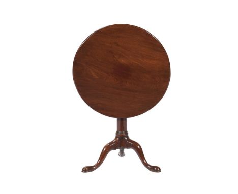 A GEORGE III MAHOGANY TRIPOD TABLE  CIRCA 1750 With 'gun barrel' stem 70cm high, 71cm diameter 
