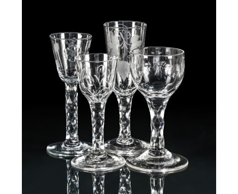 A GROUP OF DRINKING GLASSES  LATE 18TH CENTURY Comprising; three various facet-stemmed wine glasses and an ale flute  17cm hi