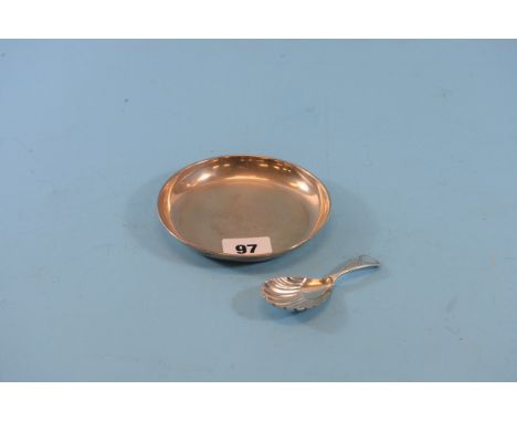 A LATE VICTORIAN SILVER CADDY SPOON with foliate engraved handle, maker:- H. Atkins, Sheffield 1887 and a circular engine tun