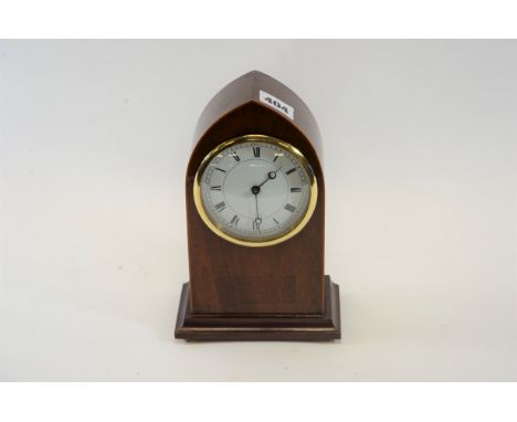 AN EDWARDIAN MAHOGANY LANCET CASED MANTLE CLOCK, circular enamel and Swiss platform balance movement, 8 1/2 ins high.   £25-£