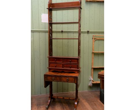 A SET OF MAHOGANY FRET-SIDED HANGING SHELVES with four base drawers, 20 ins wide and a miniature mahogany SOFA TABLE on end s