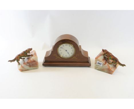 A PAIR OF 20TH CENTURY ART DECO VARIEGATED ALABASTER BOOKENDS mounted with patinated spelter dogs and an Edwardian inlaid mah