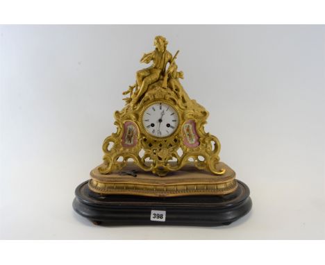 A LATE 19TH CENTURY FRENCH ORMOLU MANTLE CLOCK, white enamel dial with twin train movement, the case with inset sevres type p