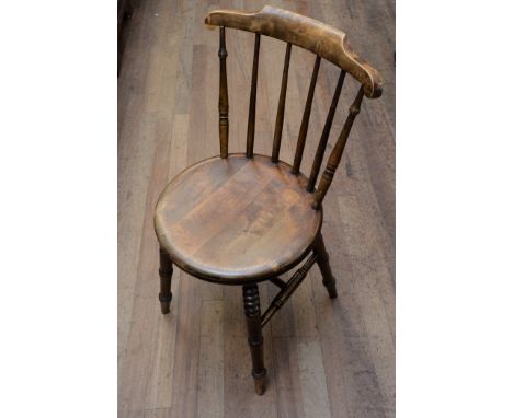 A SET OF SIX EARLY 20TH CENTURY BEECHWOOD STICK BACK IBEX STYLE CHAIRS with circular seats on turned legs.  (6)   £50-£80