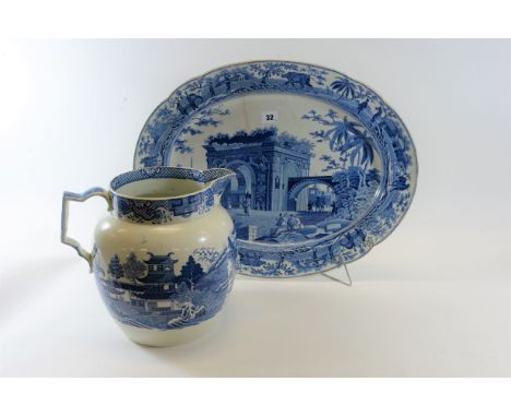 AN EARLY 19TH CENTURY OVAL SPODE BLUE AND WHITE TRANSFER "EASTERN SCENE" MEAT PLATE with exotic animal border, impressed mark