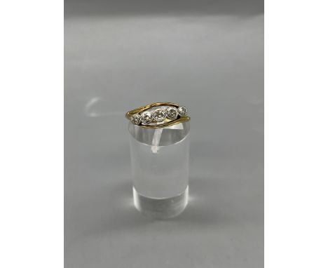 Elegant Platinum and Yellow Gold Five Stone Diamond Ring. 