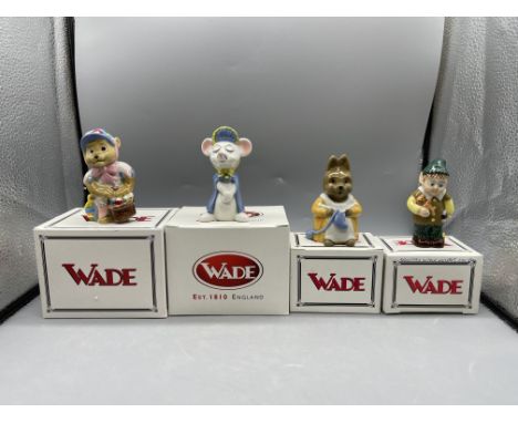 Four Boxed Wade Figurines to include Lil' Easter Bear, Arundel Lady Mouse, Knitting Bunny, and Santas Helper 
Good condition,