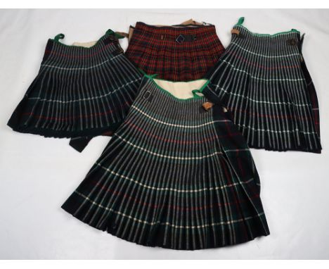 Seaforth Highlanders Tartan Kilts: Two military 1956 pattern kilts with labels inside one dated 1975 other with NATO number, 
