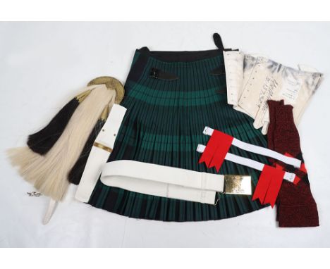 Sporran and Kilt: Royal Regiment of Scotland tartan kilt with label inside, sporran with brass metal work and leather fitting