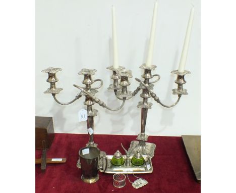 A pair of plated three-light candelabra, (a/f), 38cm high, a late-Victorian plated pen and ink stand with green glass wells, 