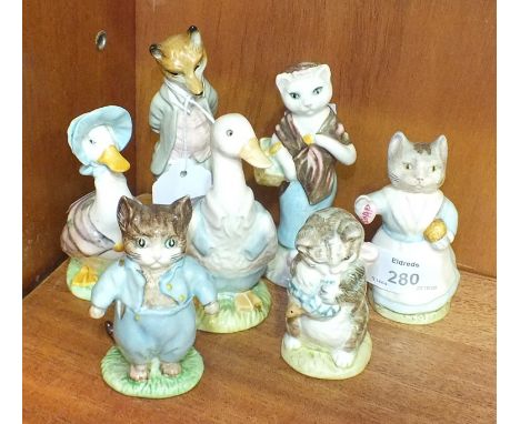 A collection of seven Beswick Beatrix Potter figures, including 'Susan', 'Tabitha Twitchett', 'Tom Kitten', 'Miss Moppet', 'M