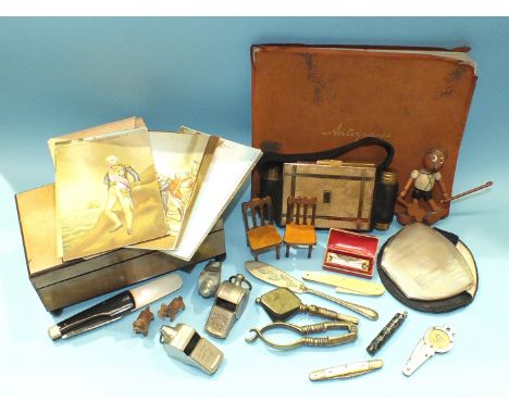 An early-20th century autograph book, a compendium compact by Kigu, a miniature harmonica by Seydel Söhne 'The Bandmaster' an