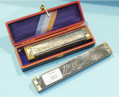 An M Hohner Super Chromica Chromatic Harmonica in original box, no.260½ and a Hero harmonica, (2).