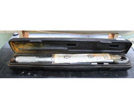 A boxed Torque wrench.