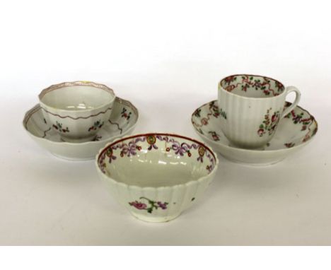 A group of late 18th/early 19th porcelain, probably New Hall consisting a coffee can and saucer dish, two tea bowls and sauce
