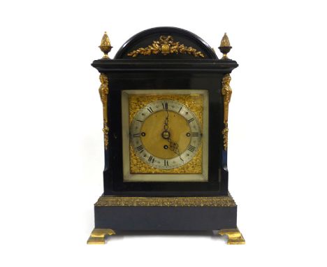 A 19th century mantle clock, the movement striking on a gong with a Westminster chime, the gilt dial with silvered chapter ri