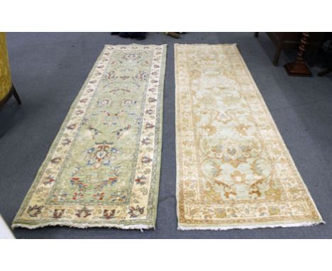 A group of 20th century decorative woollen rugs including two carpet runners and two smaller rugs