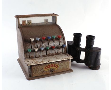 A children's' toy cash register by Codeg, together with a pair of 20th century binoculars   CONDITION REPORT:  Binoculars are
