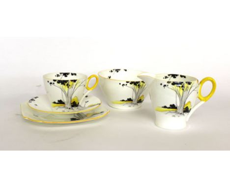 A Shelley six sitting tea service decorated with autumnal trees consisting:six tea cups,six saucers,six side plates,one sandw