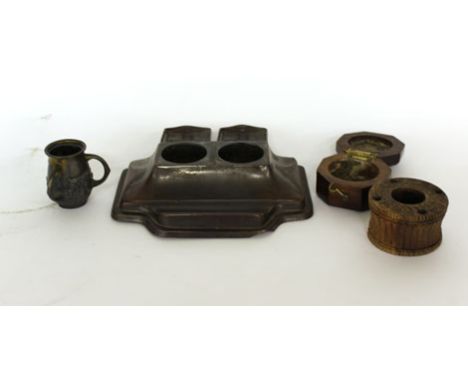 A cast metal two section inkwell, an oak desk tray with two glass inkwells and six other late 19th/early 20th century inkwell