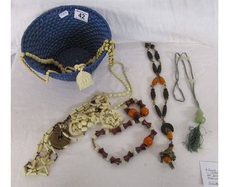 Basket of vintage necklaces