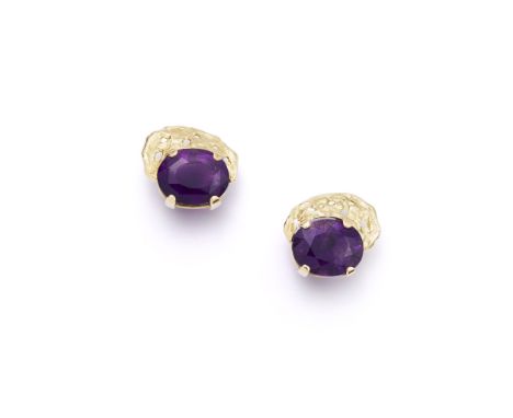 A PAIR OF AMETHYST EARRINGS, BY JOHN DONALD, 1973 Each oval-cut amethyst within an 18ct gold half surround of pierced and ham