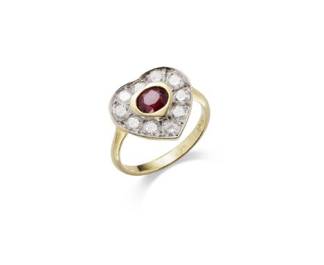 A RUBY AND DIAMOND CLUSTER RING The oval-cut ruby collet-set within a heart-shaped plaque set with brilliant-cut diamonds (Di