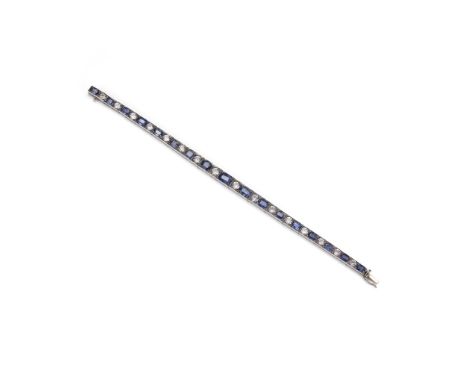 A SAPPHIRE LINE BRACELET Box-set with alternating oval or cushion-shaped sapphires and circular-cut colourless sapphires, to 