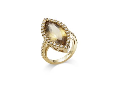 A CITRINE AND DIAMOND RING, BY PASCAL The navette-shaped citrine to a brilliant-cut diamond surround and shoulders, mounted i