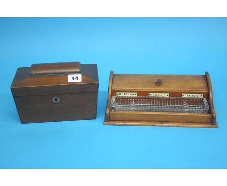 A small mahogany tea caddy and a mahogany three bottle inkwell. (2)