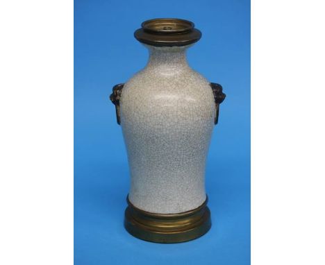 A Ji type vase, with lion mask handles, later converted to a lamp. 27.5 cm high