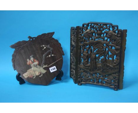 A carved hardwood table screen and a wooden plaque, inlaid with jade