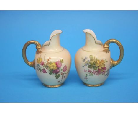 Two Royal Worcester flat back jugs, green printed marks, numbered 10/94. 11cm height