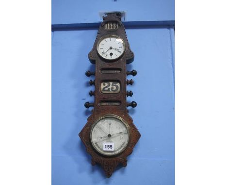 A carved mahogany clock, calendar and barometer combination