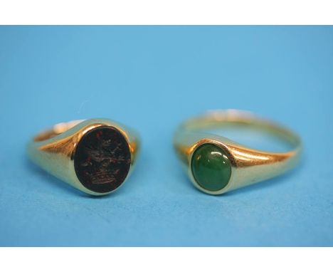 An 18ct gold Antique signet ring, set with Intaglio coat of arms and an 18ct gold signet ring, set with jade, signed Walling