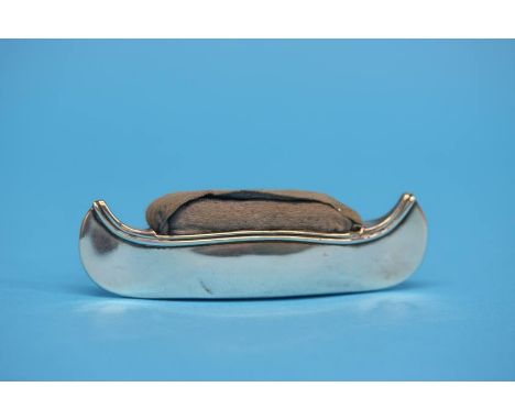 A silver canoe shaped pin cushion, Birmingham (makers marks rubbed)
