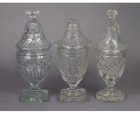 Three Georgian-style cut glass honey jars, the tallest 12¼” high. (One with broken finial/handle).