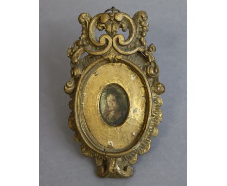 CONTINENTAL SCHOOL, later 17th/early 18th century style, a portrait miniature of a gentleman wearing long wig; 1¾” x 1¼” (ova