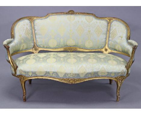 An 18th century style French carved giltwood frame sofa with rounded back, upholstered blue &amp; ivory silk damas, on four c