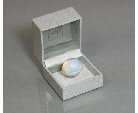 A Lalique opalescent glass finger ring of round domed design, engraved mark “Lalique, France”, size Q/R, with original box.