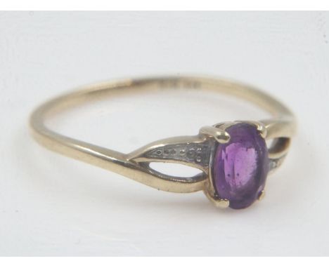 9ct gold amethyst set ring with diamond shoulders, size N/O, 1.2g. UK P&amp;P Group 0 (£6+VAT for the first lot and £1+VAT fo