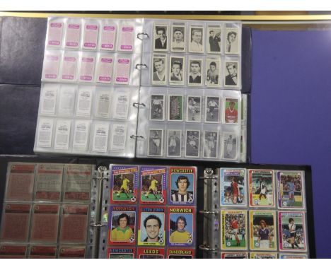 Mixed football cards in four albums including The Sun, Topps and others. UK P&amp;P Group 3 (£30+VAT for the first lot and £8